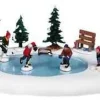 Lemax 94017 - After School Hockey Match, Battery-Operated (4.5V) - Christmas Village Table Pieces